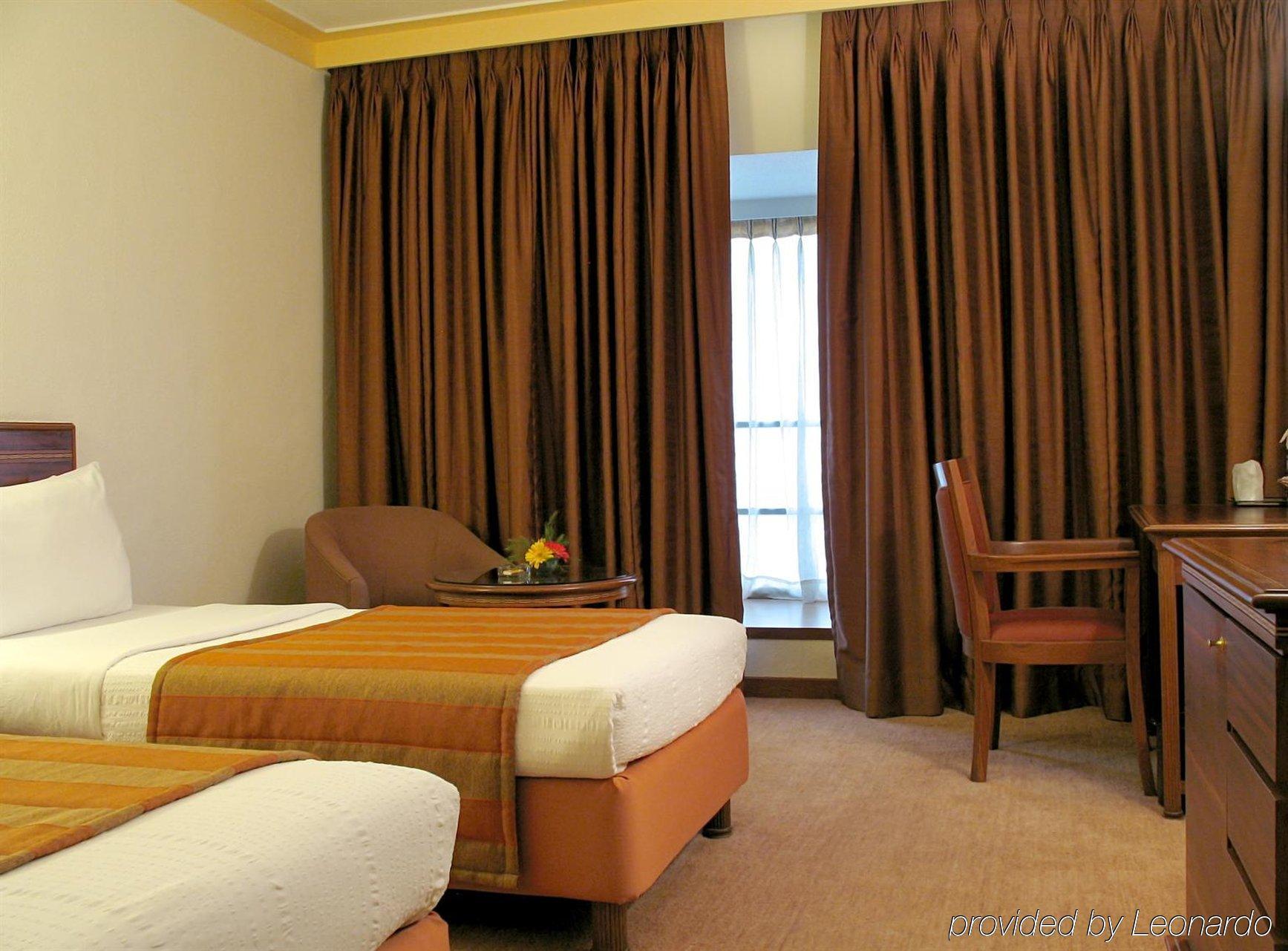 The Central Park Hotel Pune Room photo